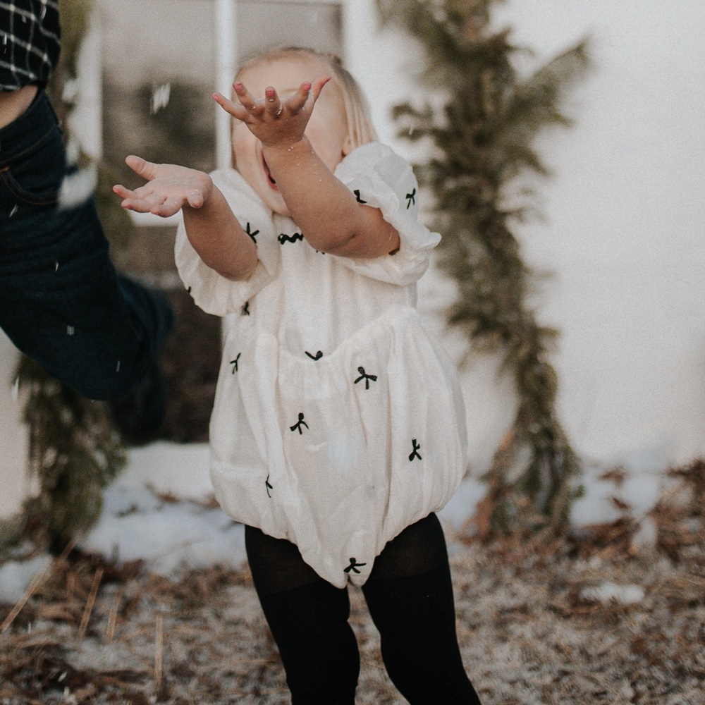 Adorable Toddler White Romper with Black Embroidery